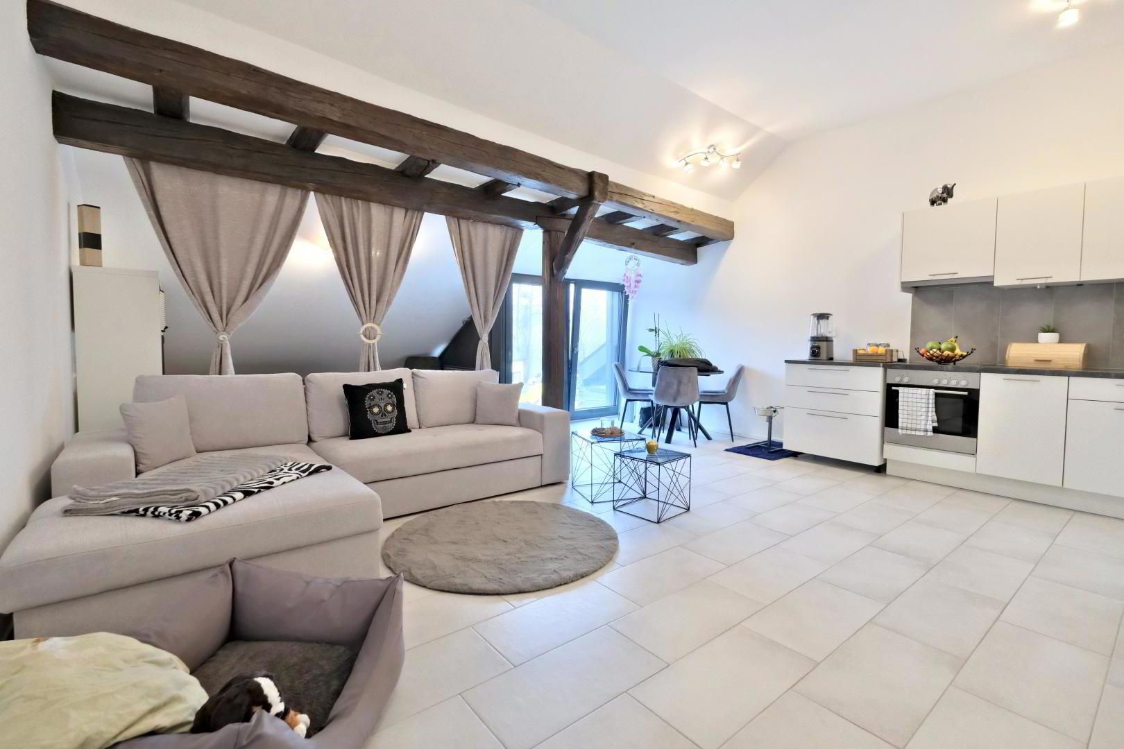 Charmant appartement avec cave et place de parc