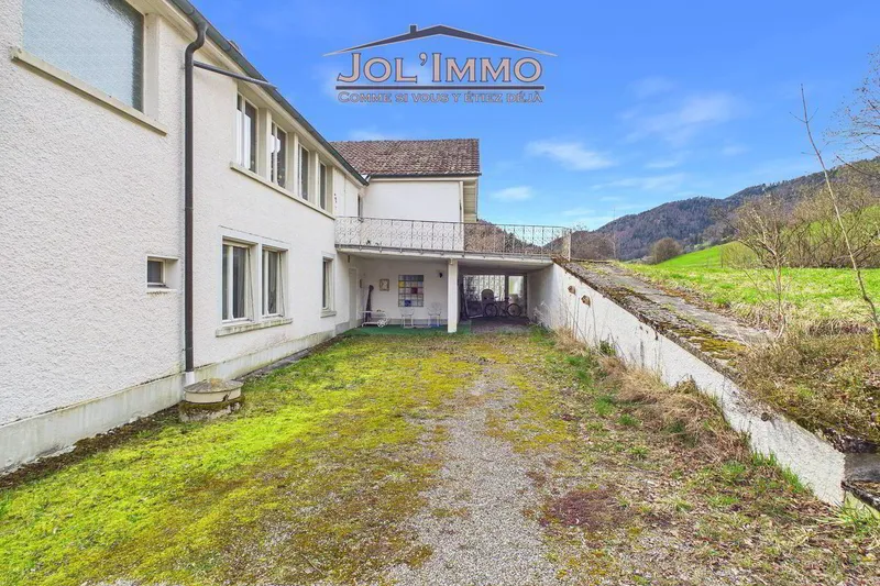 Propriété de caractère avec 3 appartements et terrain à bâtir à Perrefitte - Photo 4