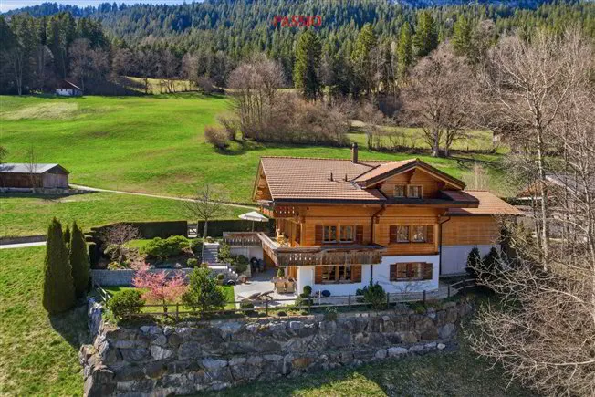 Exklusives 8.5-Zimmer-Chalet mit Einliegerpotenzial & Traumgarten - Photo 3