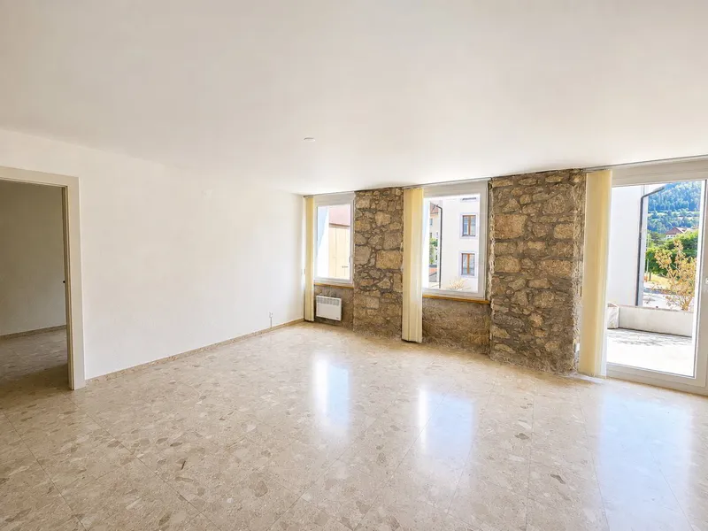 Spacieux appartement de 4,5 pièces avec terrasse et ascenseur au centre de Fleurier - Photo 3