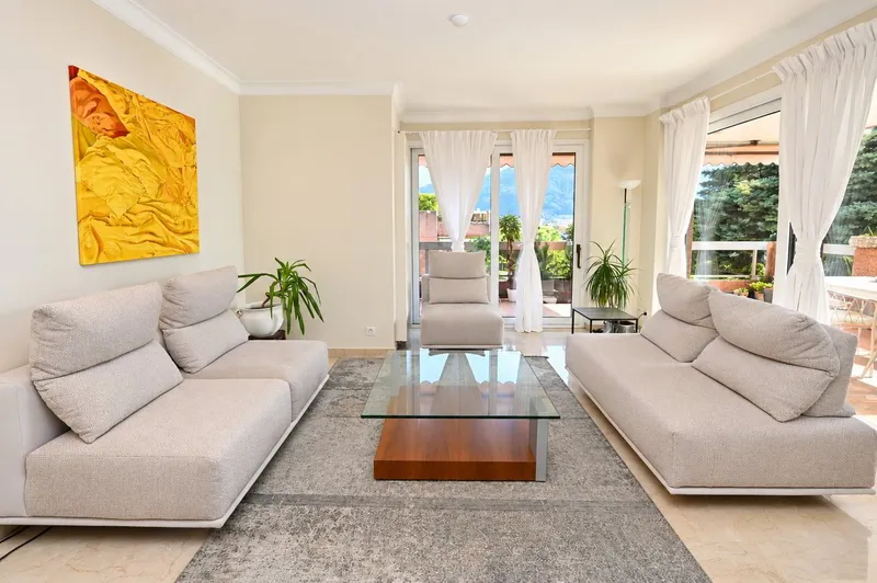 Exklusives Penthouse mit Terrasse und Blick auf den Luganer See - Photo 2